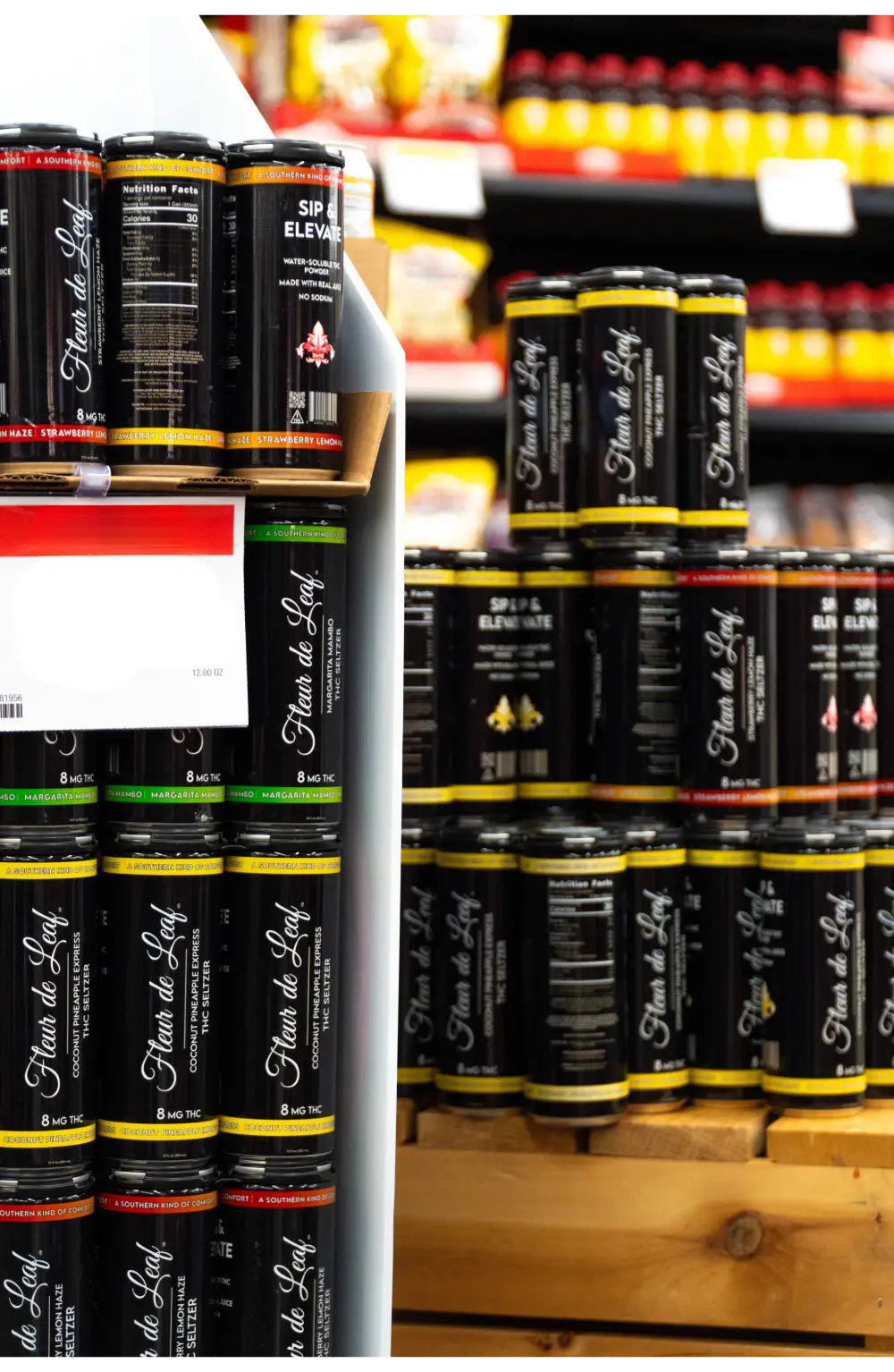 Photo of dozens of cans of THC beverage from Fleur de Leaf Wellness in a store.